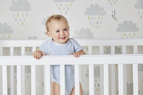 Fitted cot store mattress protector